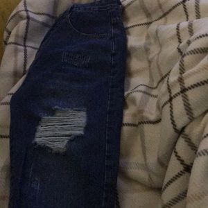 I am Selling these high waisted distressed mom jeans that just showed up today.